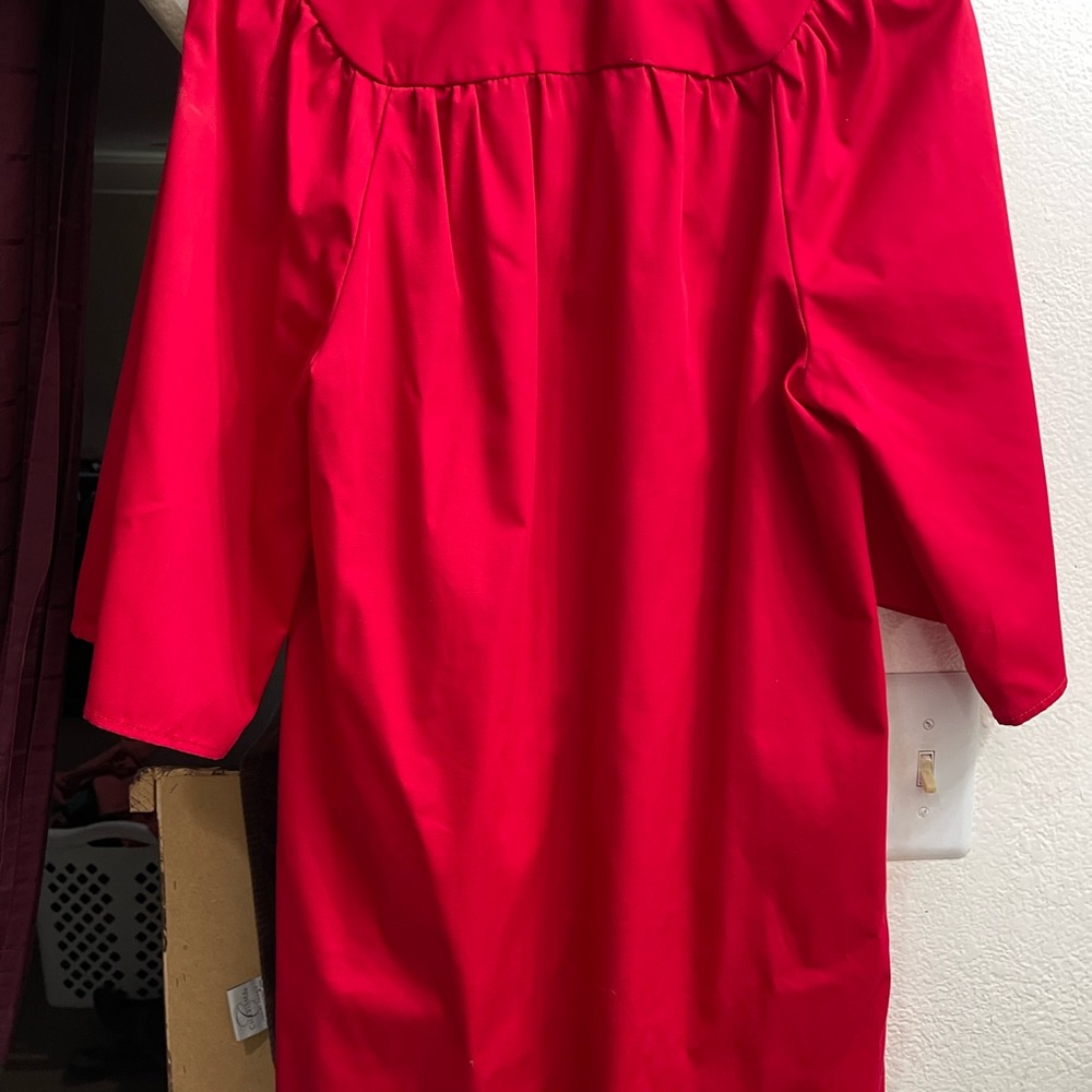 Elementary school graduation cap and gown. Color Red